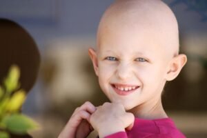 qtq80-SDItRG - Hope Foundation of the Mahoning Valley A smiling child posing for the camera