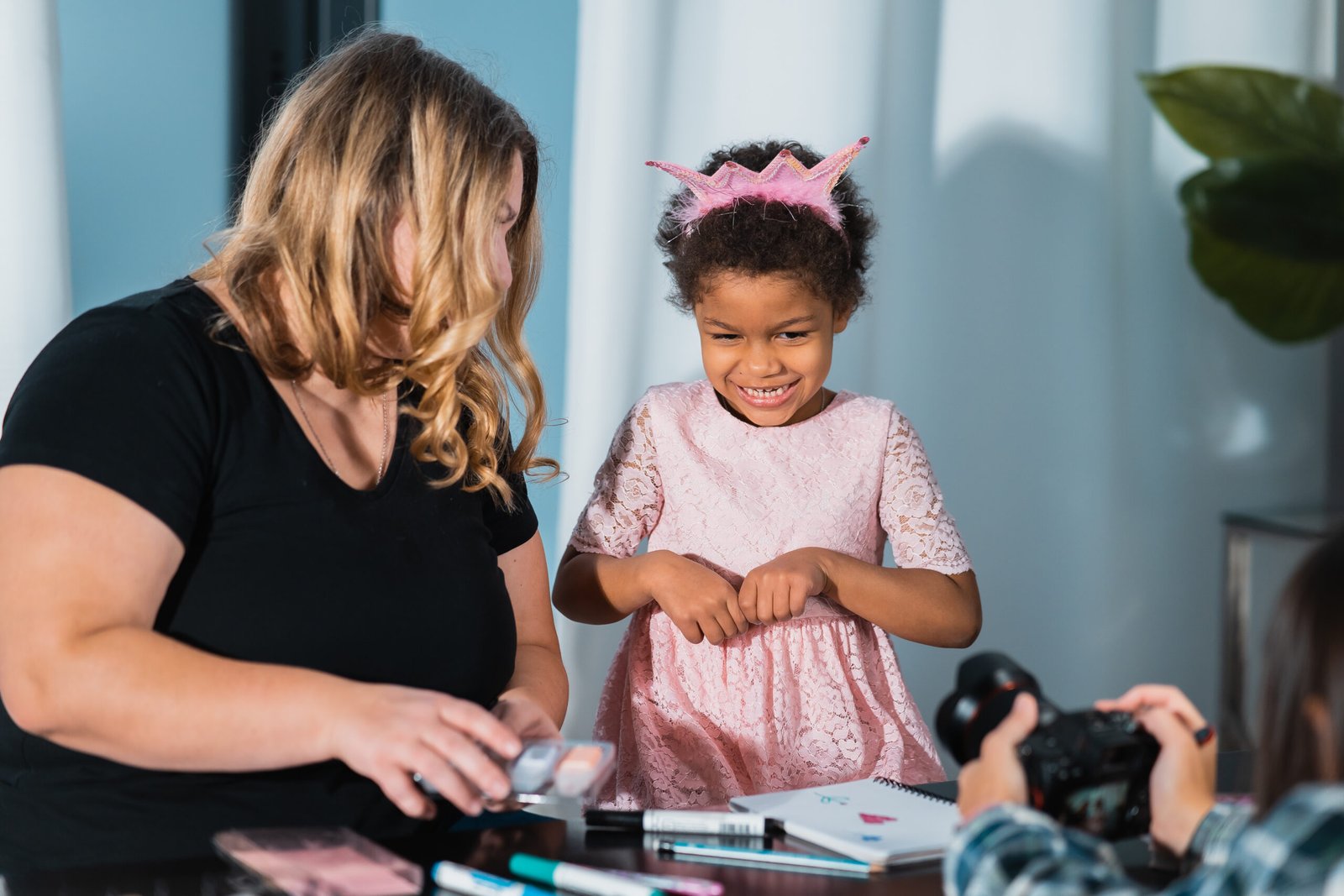 Mother and child daughter draws creatively at home at the table - Hope Foundation of the Mahoning Valley
