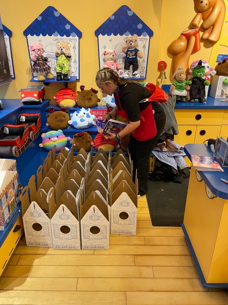 Families and volunteers at a holiday toy-shopping event for Hope Foundation children