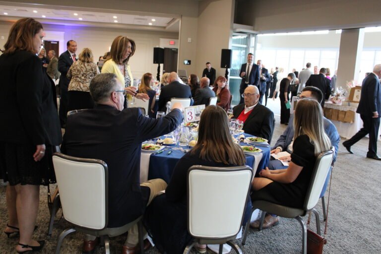 Guests seated at round tables during the Wine for Hope 2027 planning event