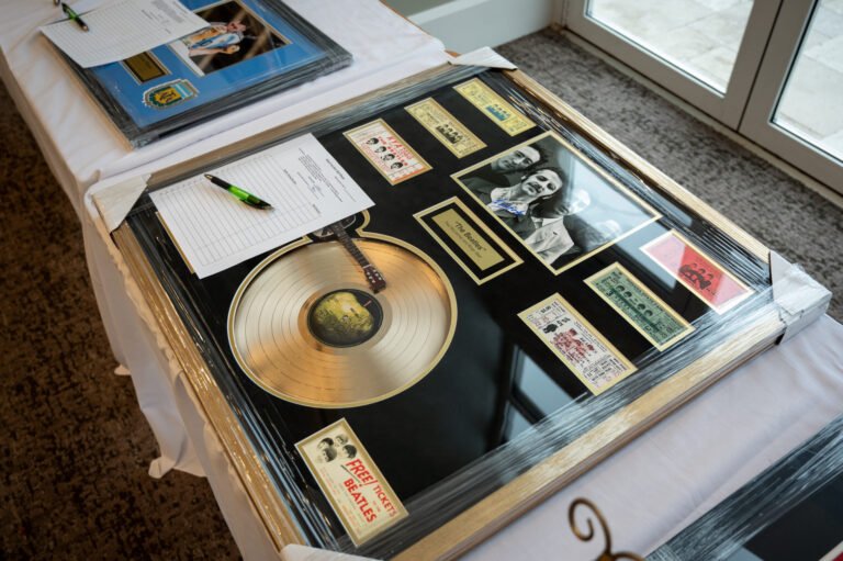 Framed Beatles memorabilia display, a past Wine for Hope silent auction item