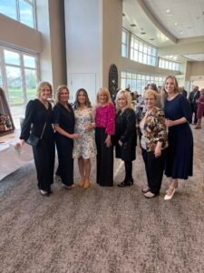 Guests celebrating together at Wine for Hope 2026
